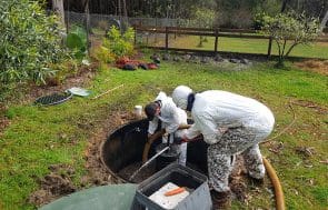 South Coast SIte Rentals: septic technicians performing effluent pump out