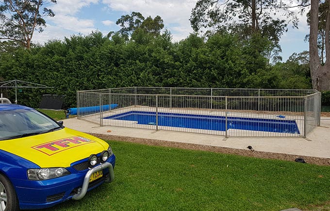 South Coast Site Rentals: Temporary pool fencing in a Shoalhaven backyard.