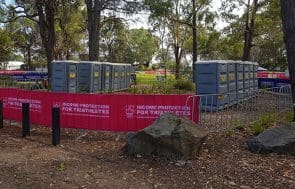 South Coast Site rentals: Triathlon temporary event toilets surrounded by temorary fencing